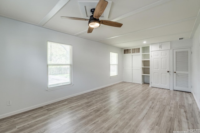 326 Sublett, San Antonio, TX 78223 - unfurnished bedroom featuring light wood-type flooring, baseboards, a ceiling fan, and a closet