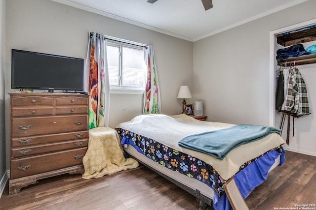 6034 Royal, San Antonio, TX 78239 - bedroom with ornamental molding, dark wood-type flooring, ceiling fan, and a closet