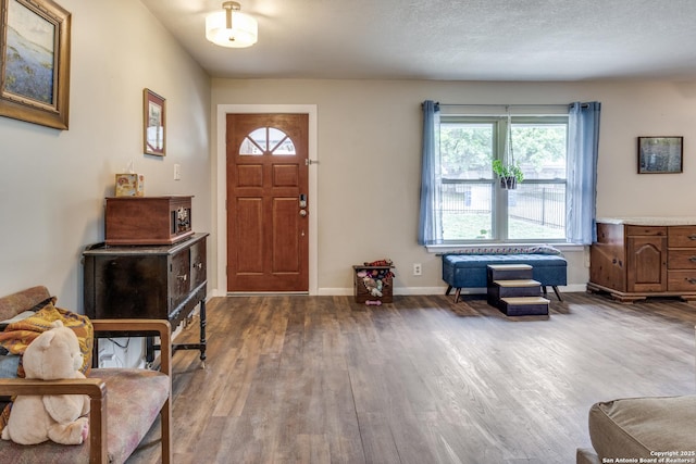 6034 Royal, San Antonio, TX 78239 - entryway with wood finished floors and baseboards