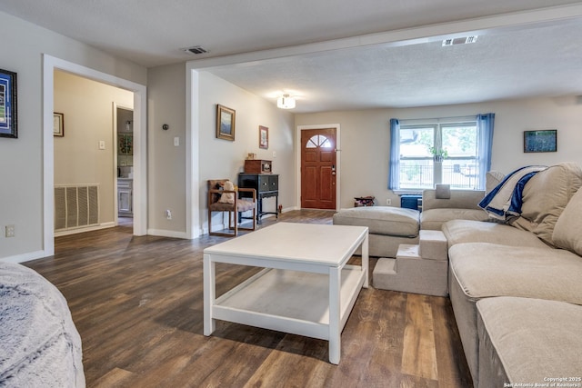 6034 Royal, San Antonio, TX 78239 - living room with dark wood finished floors and baseboards