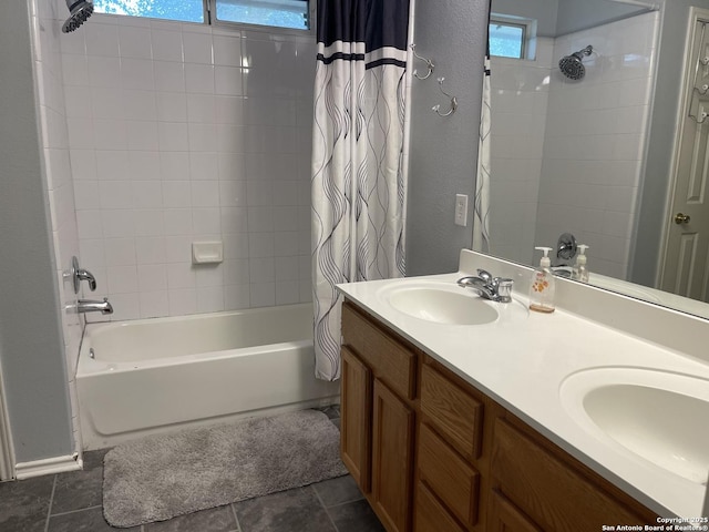 4122 Chinkapin Oak, San Antonio, TX 78223 - bathroom with shower / bath combo with shower curtain, double vanity, and a textured wall