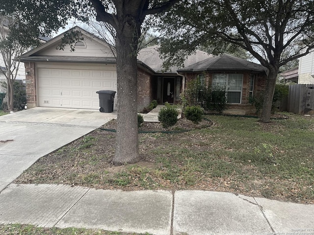 4122 Chinkapin Oak, San Antonio, TX 78223 - ranch-style home with brick siding, an attached garage, and driveway