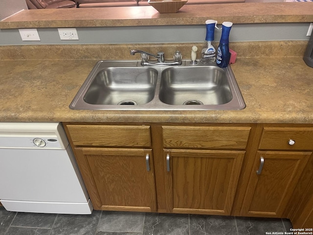 4122 Chinkapin Oak, San Antonio, TX 78223 - kitchen view of dishwasher, a sink, and brown cabinetry