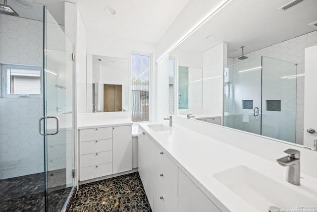 543 Leigh, San Antonio, TX 78210 - full bathroom featuring a shower stall, double vanity, and recessed lighting