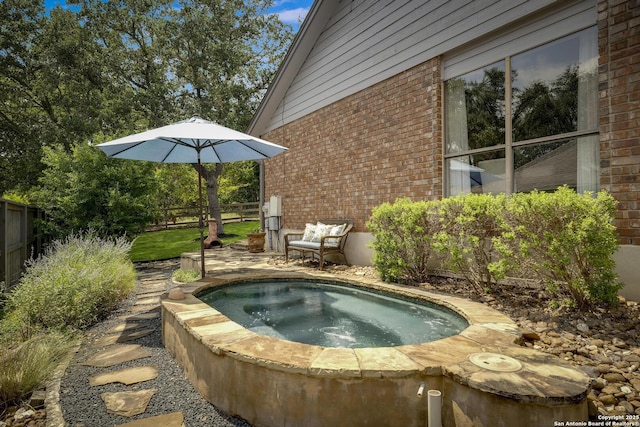 7011 Washita Way, San Antonio, TX 78256 - view of swimming pool with an in-ground hot tub