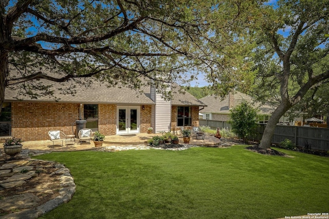 7011 Washita Way, San Antonio, TX 78256 - rear view of property with french doors, brick siding, a patio area, and roof with shingles
