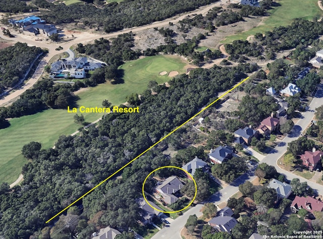 7011 Washita Way, San Antonio, TX 78256 - aerial view of residential area featuring a golf course and property boundaries highlighted