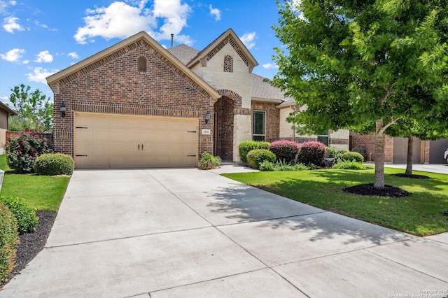 1036 Carriage, New Braunfels, TX 78132 - view of front of property featuring brick siding, a garage, concrete driveway, and a front yard