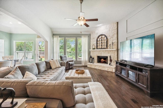 1036 Carriage, New Braunfels, TX 78132 - living room with ceiling fan, dark wood finished floors, a stone fireplace, and recessed lighting