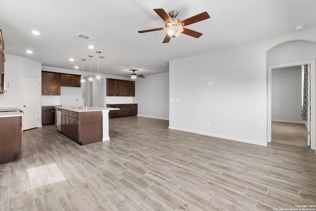 164 Antler Bnd, San Antonio, TX 78253 - kitchen featuring open floor plan, ceiling fan, light countertops, recessed lighting, and a center island with sink