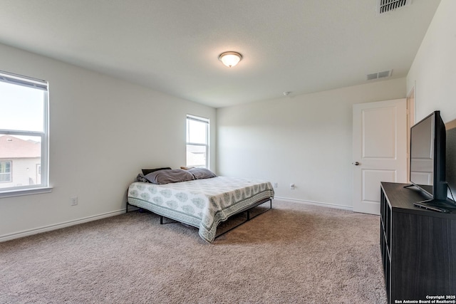 11745 Red Pheasant, San Antonio, TX 78245 - bedroom featuring light carpet and baseboards
