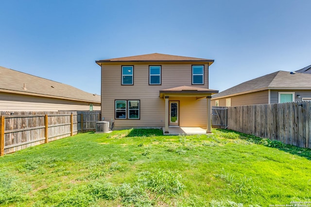 11745 Red Pheasant, San Antonio, TX 78245 - rear view of property with central air condition unit and a patio