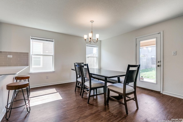 11745 Red Pheasant, San Antonio, TX 78245 - dining area with plenty of natural light and dark wood finished floors