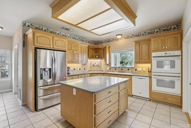 269 Red Rose, Spring Branch, TX 78070 - kitchen featuring white appliances, light tile patterned flooring, and backsplash