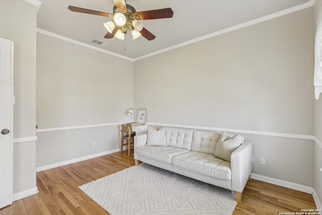 269 Red Rose, Spring Branch, TX 78070 - sitting room featuring ceiling fan, wood finished floors, and ornamental molding