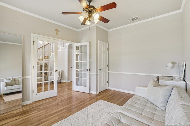 269 Red Rose, Spring Branch, TX 78070 - bedroom featuring french doors, wood finished floors, crown molding, and a ceiling fan