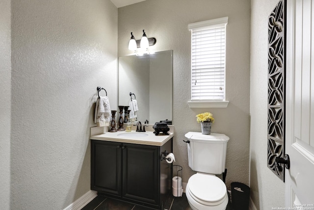 8126 Powderhorn Run, San Antonio, TX 78255 - bathroom with vanity, toilet, and a textured wall