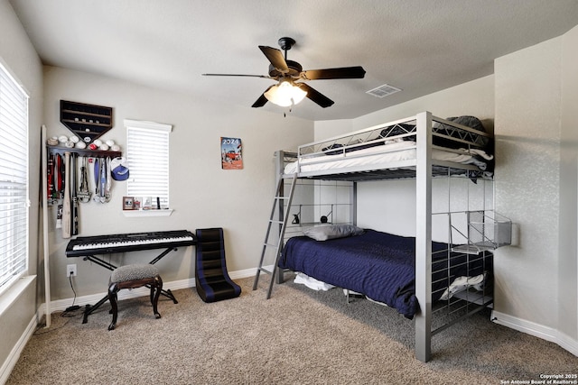 8126 Powderhorn Run, San Antonio, TX 78255 - bedroom featuring multiple windows, carpet floors, and a ceiling fan