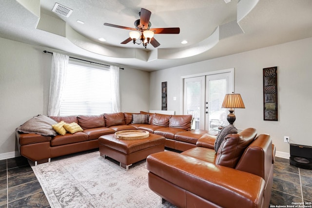 8126 Powderhorn Run, San Antonio, TX 78255 - living area with a raised ceiling, baseboards, plenty of natural light, ceiling fan, and recessed lighting