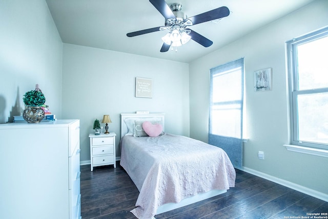 3606 Mill Mdw, San Antonio, TX 78247 - bedroom featuring dark wood-style flooring, multiple windows, baseboards, and a ceiling fan