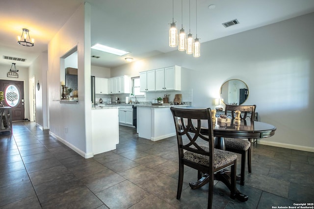 3606 Mill Mdw, San Antonio, TX 78247 - dining space with plenty of natural light, baseboards, and a chandelier