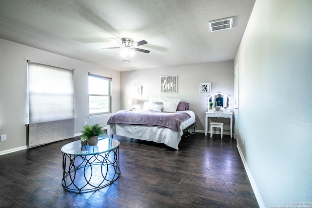 3606 Mill Mdw, San Antonio, TX 78247 - bedroom featuring baseboards, wood finished floors, a textured ceiling, and a ceiling fan