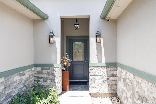 9527 Butterfly Bnd, San Antonio, TX 78224 - entrance to property with stucco siding and stone siding