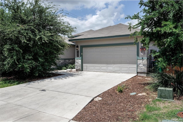 9527 Butterfly Bnd, San Antonio, TX 78224 - view of front of home with stone siding, concrete driveway, stucco siding, a garage, and roof with shingles