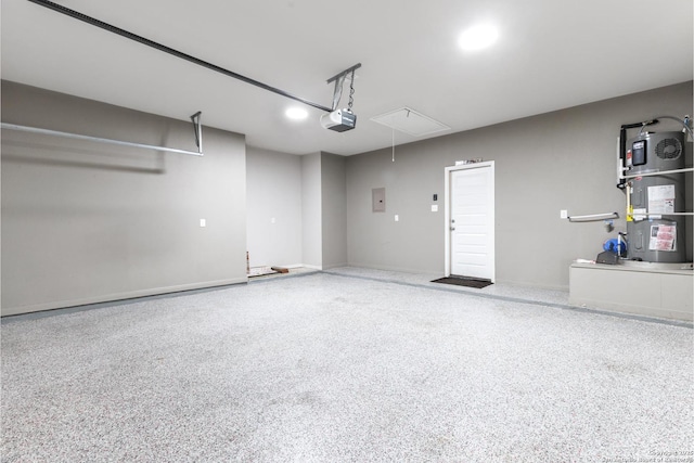 9527 Butterfly Bnd, San Antonio, TX 78224 - garage featuring water heater and a garage door opener