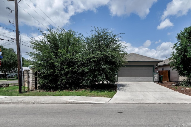 9527 Butterfly Bnd, San Antonio, TX 78224 - view of front of property featuring an attached garage and concrete driveway