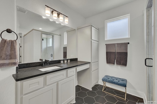 681 Treetop, New Braunfels, TX 78130 - bathroom with healthy amount of natural light, vanity, and a stall shower
