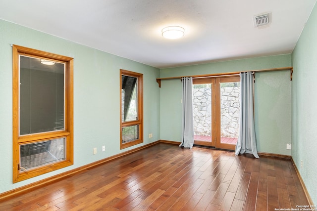 13810 S Port Blf, San Antonio, TX 78216 - unfurnished room featuring baseboards and wood-type flooring
