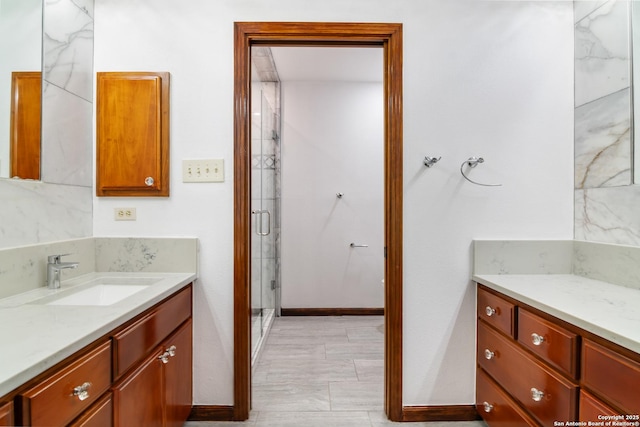 13810 S Port Blf, San Antonio, TX 78216 - bathroom with vanity, a stall shower, and baseboards
