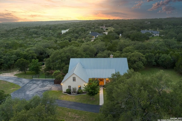 278 Stonebrook, New Braunfels, TX 78132 - aerial view at dusk of a wooded view