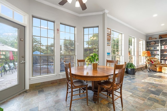 278 Stonebrook, New Braunfels, TX 78132 - dining space with stone tile floors, crown molding, ceiling fan, and recessed lighting