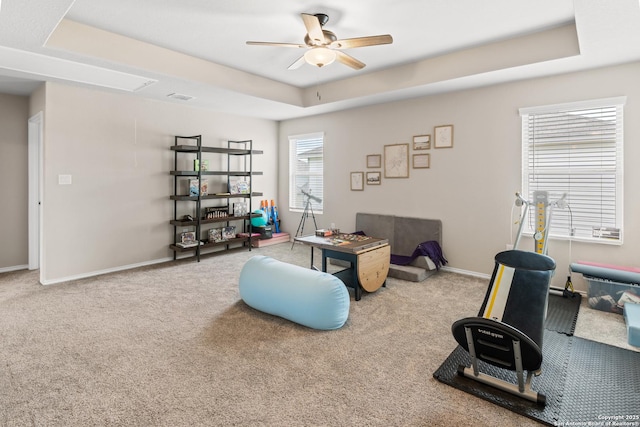 2079 Chelsea Grv, New Braunfels, TX 78130 - sitting room with a tray ceiling, a ceiling fan, carpet, and baseboards