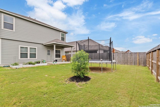 2079 Chelsea Grv, New Braunfels, TX 78130 - view of yard with a trampoline and a patio