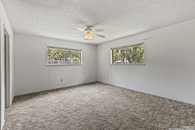 1706 Hickory St, Floresville, TX 78114 - carpeted spare room featuring ceiling fan and a textured ceiling