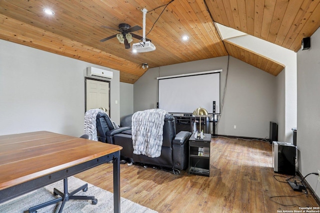 557 Jacobs Ln, La Vernia, TX 78121 - home theater featuring lofted ceiling, wood ceiling, wood finished floors, a ceiling fan, and a wall mounted AC