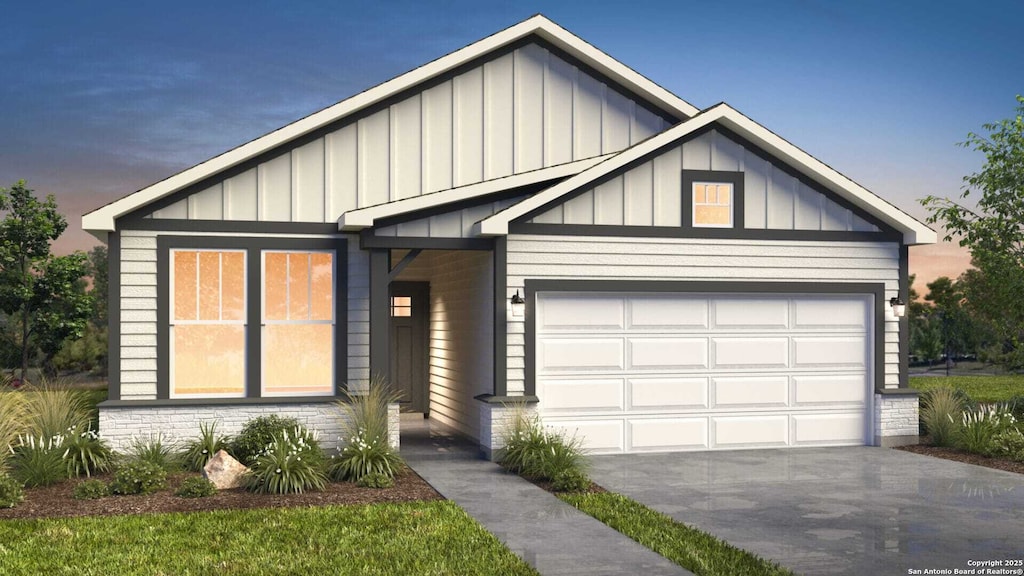 979 Manger Ln, New Braunfels, TX 78130 - view of front of home with board and batten siding, asphalt driveway, and a garage