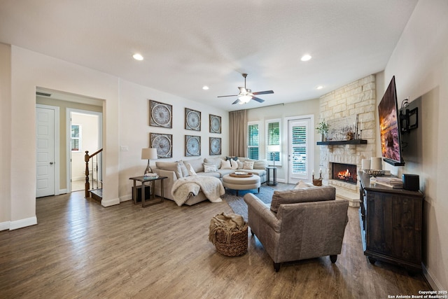 28915 Porch Swing, Boerne, TX 78006 - living area with a fireplace, wood finished floors, baseboards, a ceiling fan, and recessed lighting