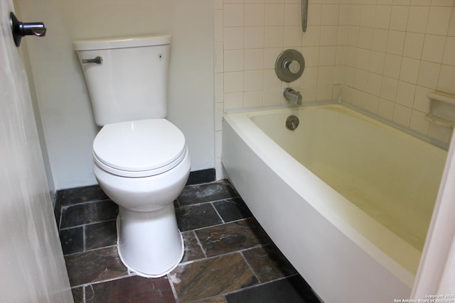 11815 Vance Jackson Unit 301, San Antonio, TX 78230 - full bathroom with toilet and stone tile flooring