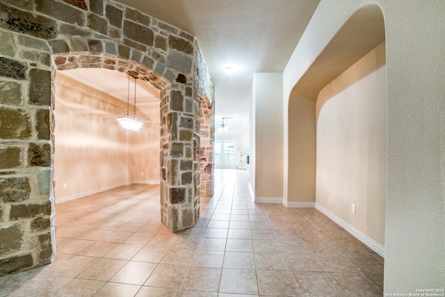 3330 Marlark Pass, San Antonio, TX 78261 - hall with tile patterned flooring and arched walkways