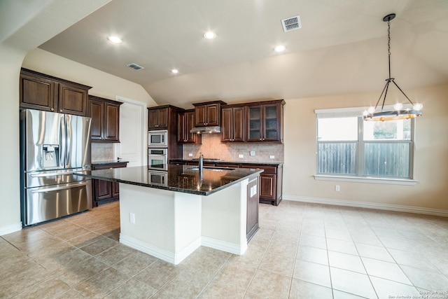 3330 Marlark Pass, San Antonio, TX 78261 - kitchen with stainless steel appliances, lofted ceiling, under cabinet range hood, backsplash, and dark brown cabinetry
