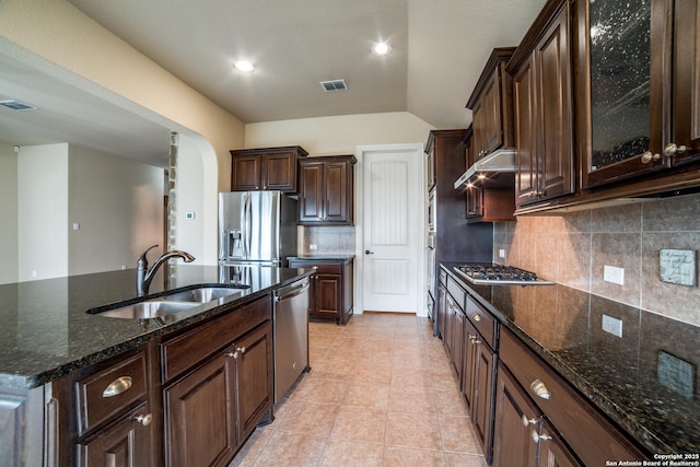 3330 Marlark Pass, San Antonio, TX 78261 - kitchen featuring a sink, appliances with stainless steel finishes, under cabinet range hood, dark brown cabinetry, and backsplash