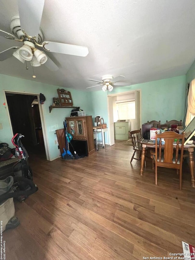 413 4th St, Poteet, TX 78065 - dining room with ceiling fan and wood finished floors