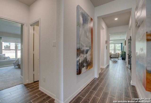 8952 San Carlos, Seguin, TX 78155 - corridor featuring wood finish floors, baseboards, and recessed lighting