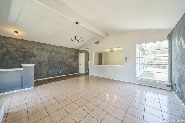 3501 Ridge Knoll St, San Antonio, TX 78247 - spare room with tile patterned flooring, baseboards, an accent wall, arched walkways, and wallpapered walls