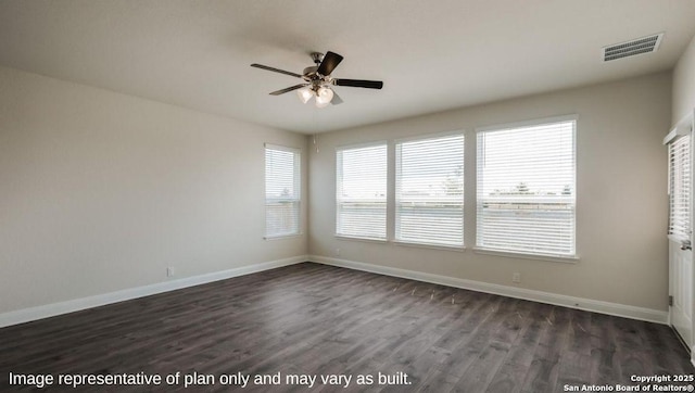 21003 Millstream Bnd, San Antonio, TX 78266 - spare room featuring a ceiling fan, dark wood-style floors, and baseboards
