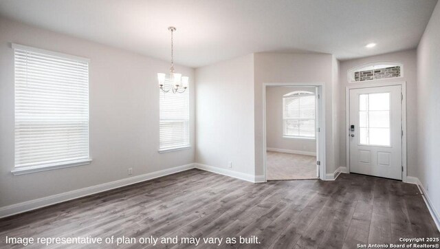 21003 Millstream Bnd, San Antonio, TX 78266 - foyer with a chandelier, wood finished floors, baseboards, and recessed lighting